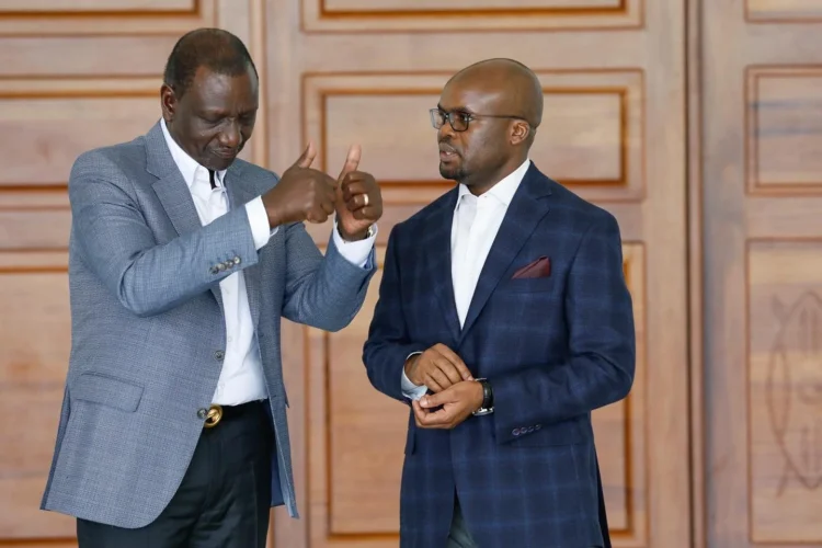 Raymond Omollo with William Ruto